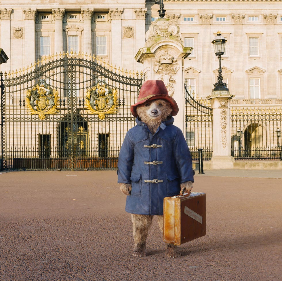 a character stands in front of a grand building with ornate gates and classical architecture a character stands in front of a grand building with ornate gates and classical architecture