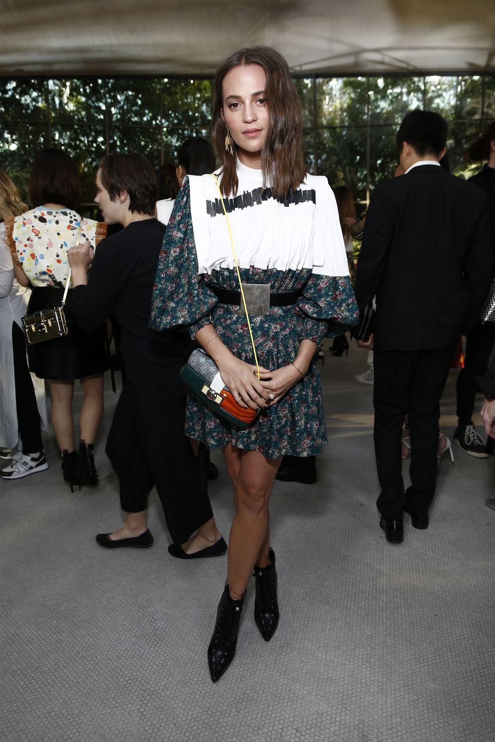 Emma Stone & More Celebs at Louis Vuitton Resort 2020 Show, Photos –  Footwear News