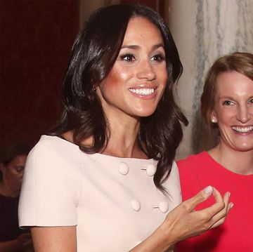 Kate and Meghan both wearing pink skirt suits