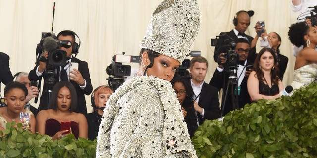 Rihanna Wears Elaborate Dress and Papal Mitre to 2018 Met Gala