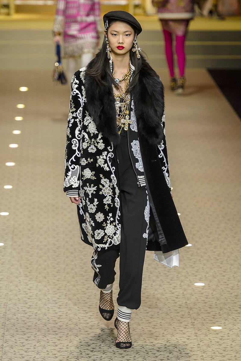 Clothing, Fashion, Fashion model, Street fashion, Fashion show, Runway, Outerwear, Fur, Coat, Footwear, 