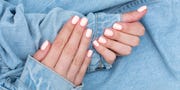 manicure in mint color on the white mint background