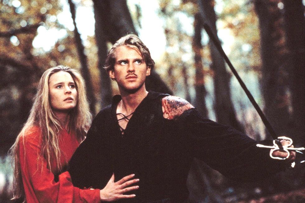 a confrontational scene between two characters in a forest setting