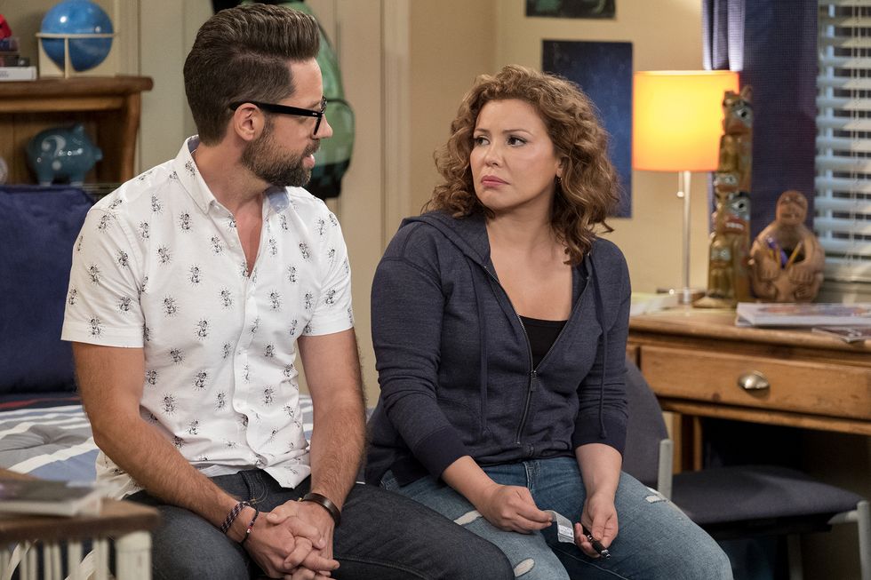 Schneider and Penelope in Season 3 of One Day at a Time.