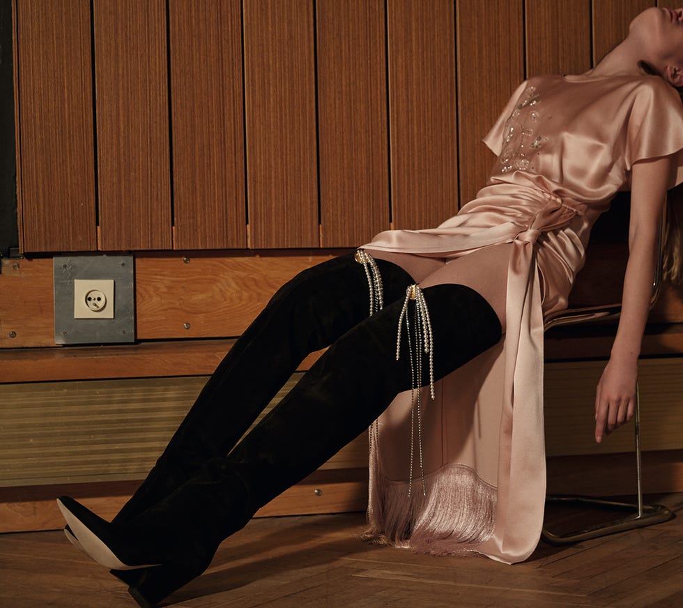 Leg, Fashion, Footwear, Sitting, Human body, Dress, Photography, Long hair, High heels, Human leg, 