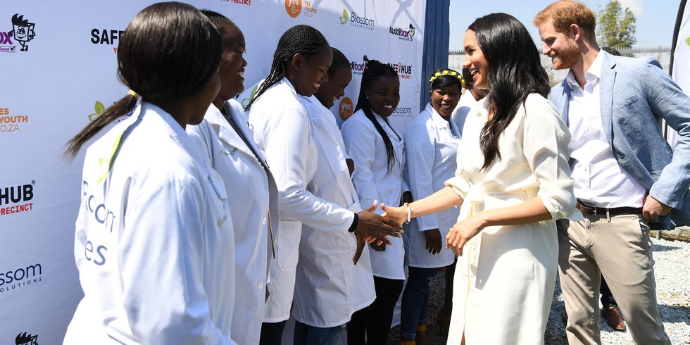 White coat, Uniform, Event, Adaptation, Job, Physician, Team, Gesture, Employment, 