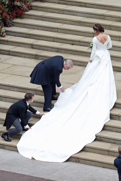 Bride, Wedding dress, Photograph, Dress, Gown, Bridal clothing, Veil, Ceremony, Wedding, Interaction, 