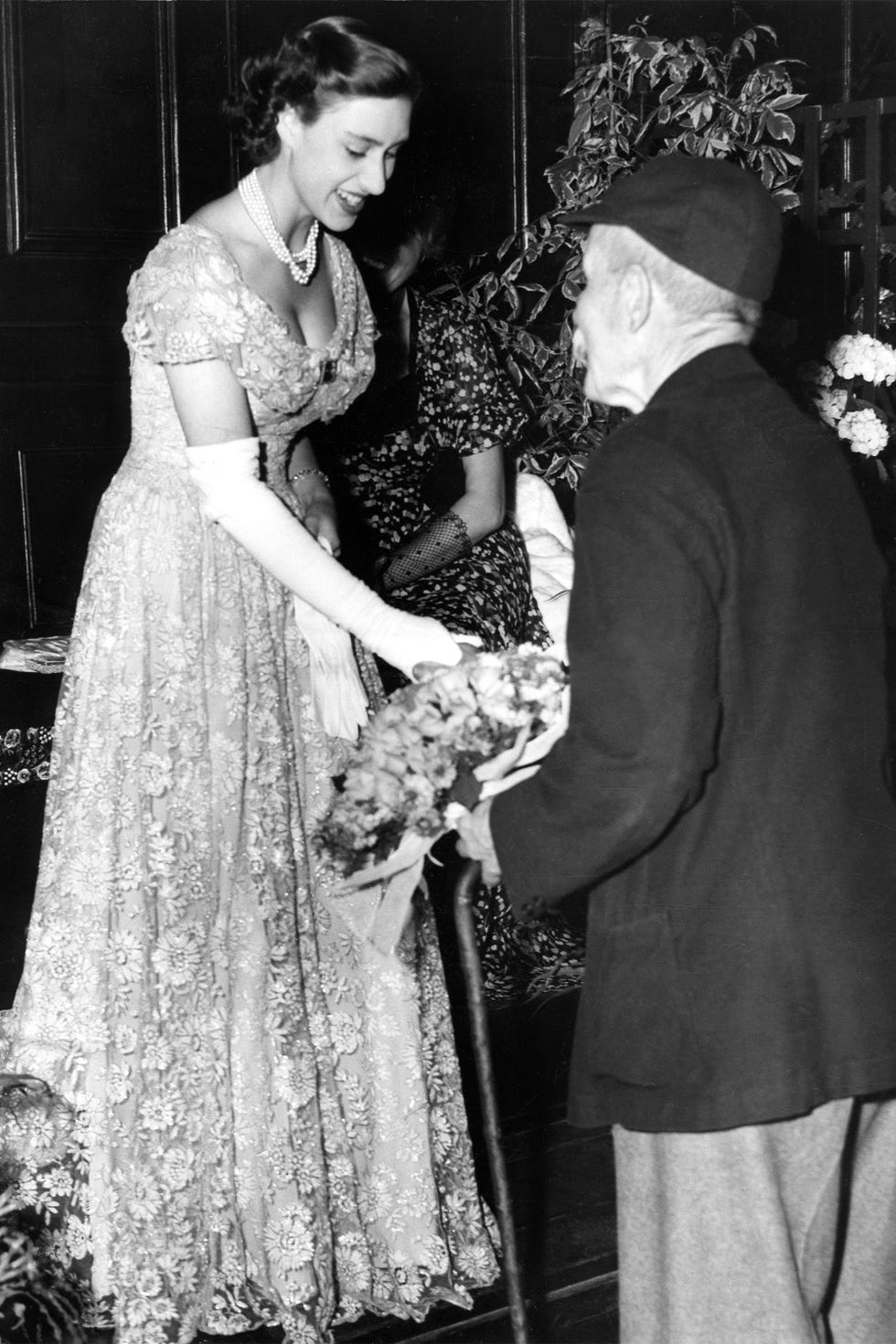 Photograph, Gown, Dress, Wedding dress, Fashion, Standing, Black-and-white, Headpiece, Monochrome photography, Monochrome, 