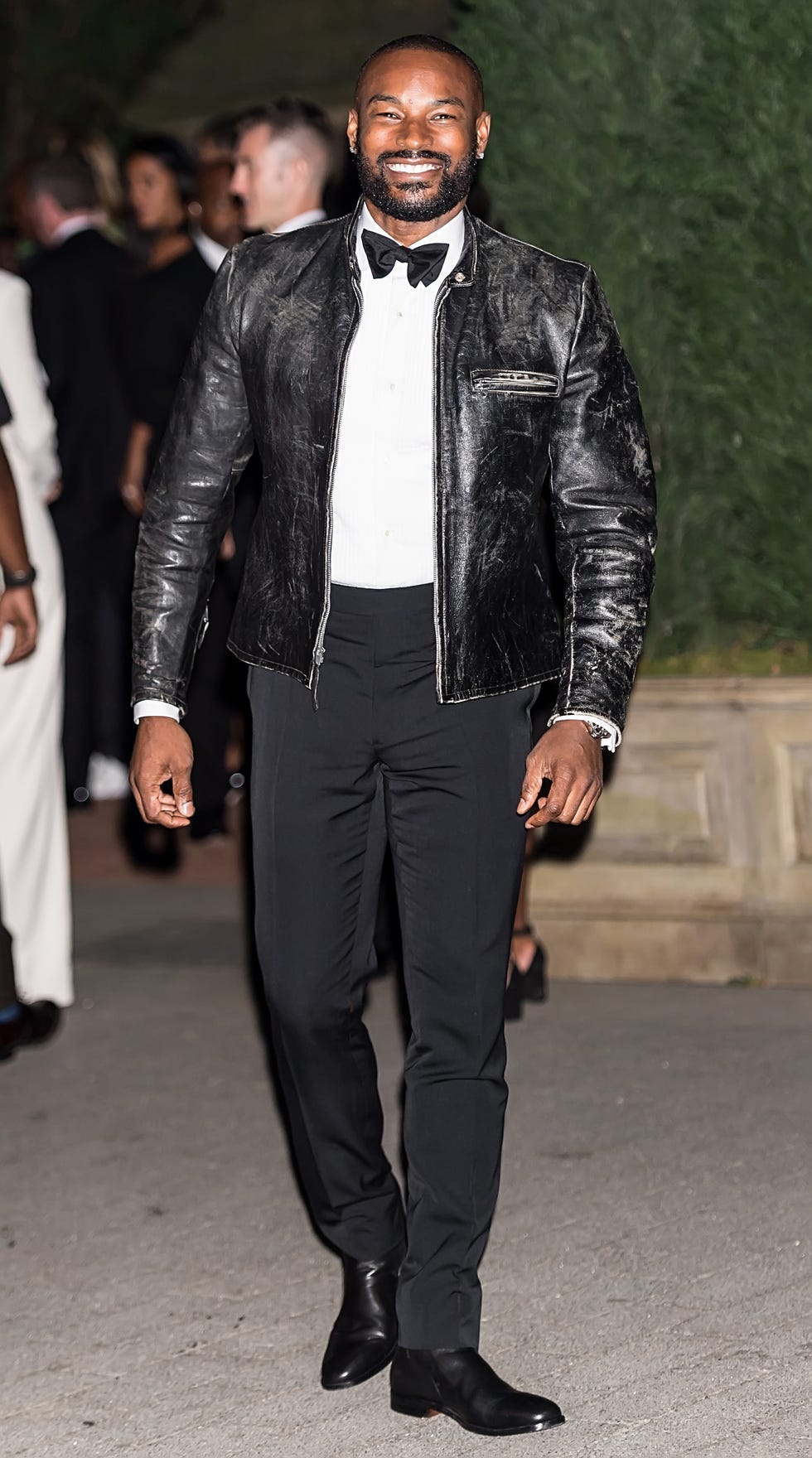Clothing, Fashion, Suit, Leather jacket, Leather, Fashion model, Jacket, Fashion show, Outerwear, Formal wear, 