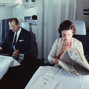 the queen and prince philip on board a private jet 1969