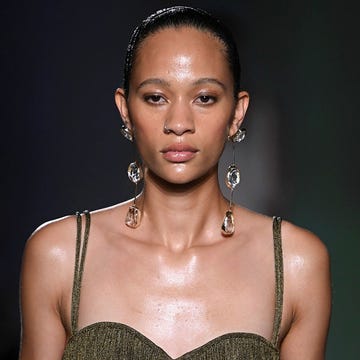 three models on runways wear spring jewelry trends to illustrate a guide to spring 2023 jewelry trends