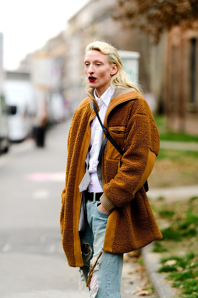 Fur, Clothing, Street fashion, Fur clothing, Fashion, Outerwear, Coat, Yellow, Brown, Textile, 