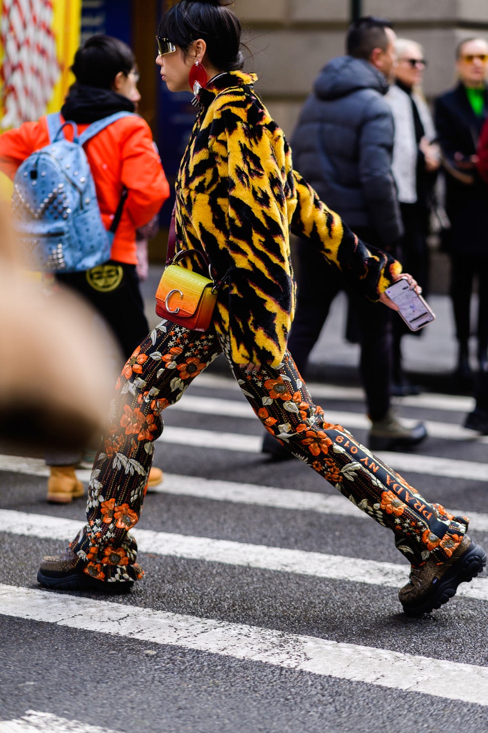 Street fashion, Orange, Footwear, Street, Fur, Photography, Recreation, Road, Asphalt, 