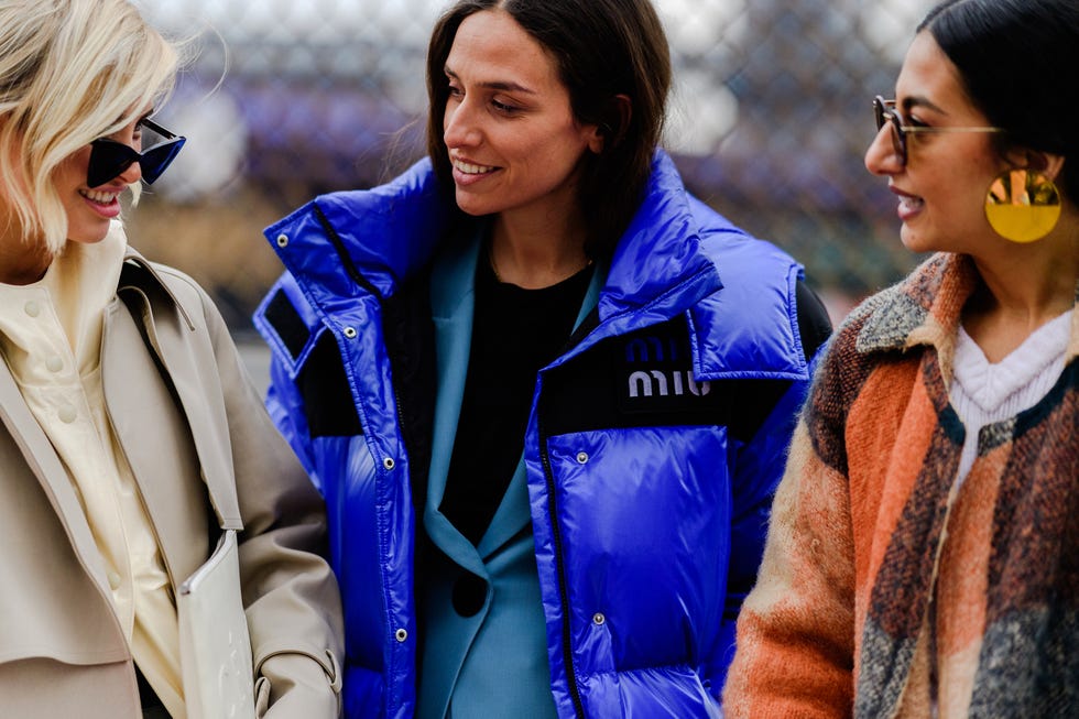 People, Fashion, Outerwear, Human, Jacket, Street fashion, Electric blue, Event, Conversation, Jeans, 