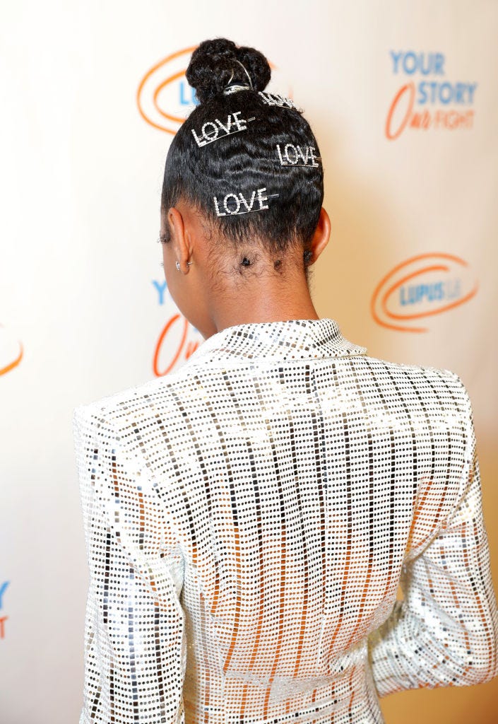 Hair, Hairstyle, Bun, Forehead, Chin, Neck, Chignon, Shoulder, Black hair, Ear, 