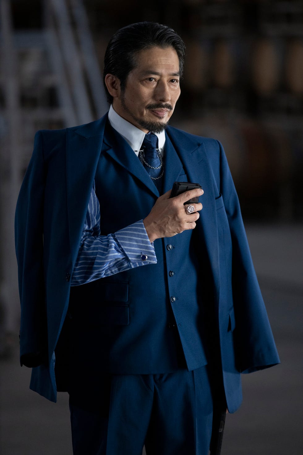 Suit, Formal wear, Tuxedo, White-collar worker, Standing, Fashion, Outerwear, Tie, Blazer, Businessperson, 