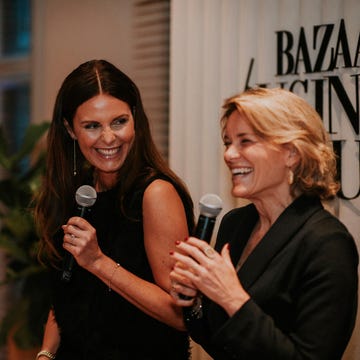 a couple of women holding microphones