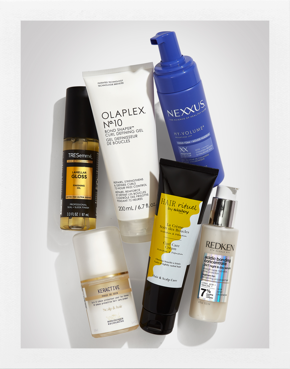 assortment of six hair care products