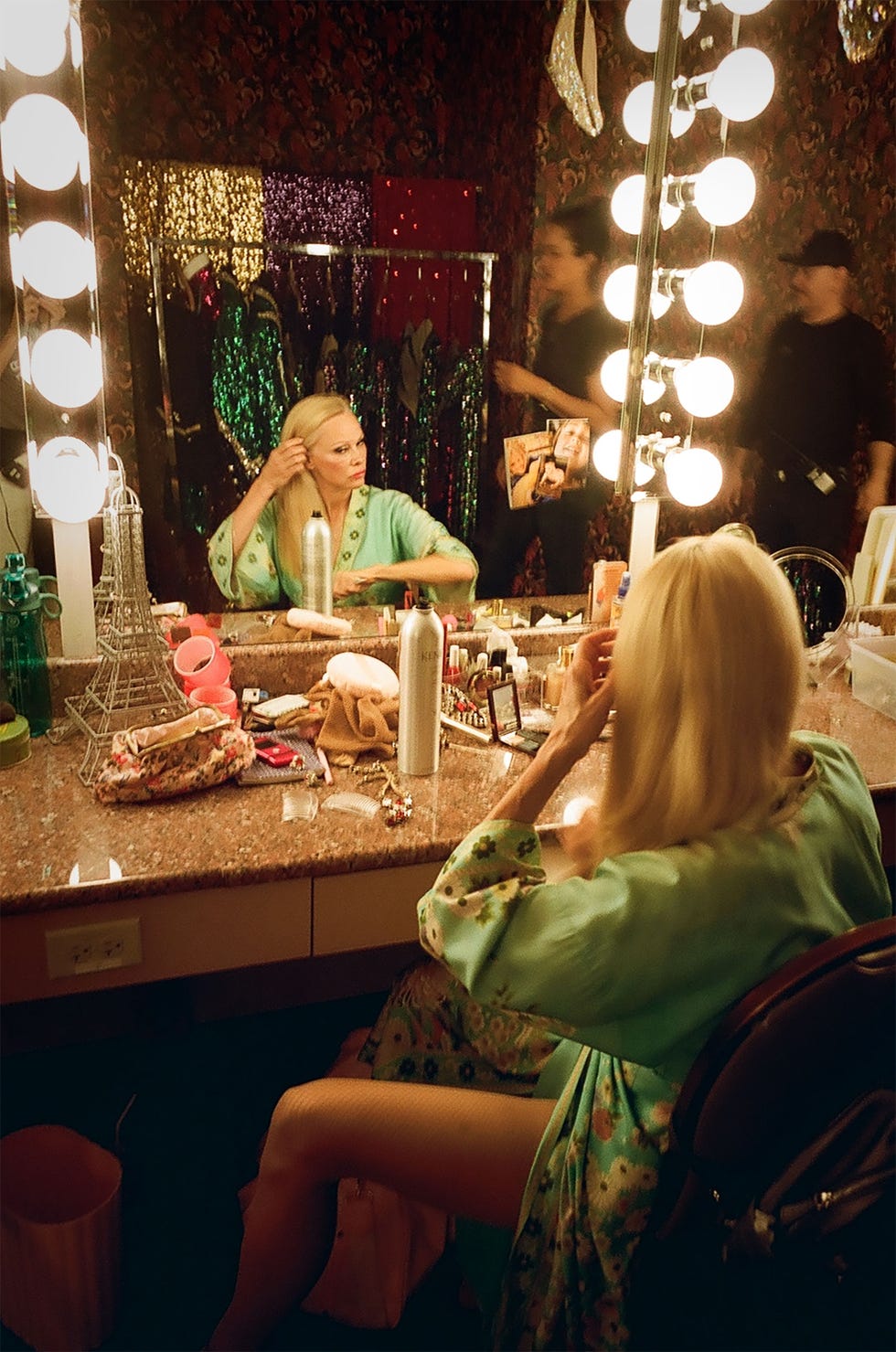 dressing room scene with makeup and styling items