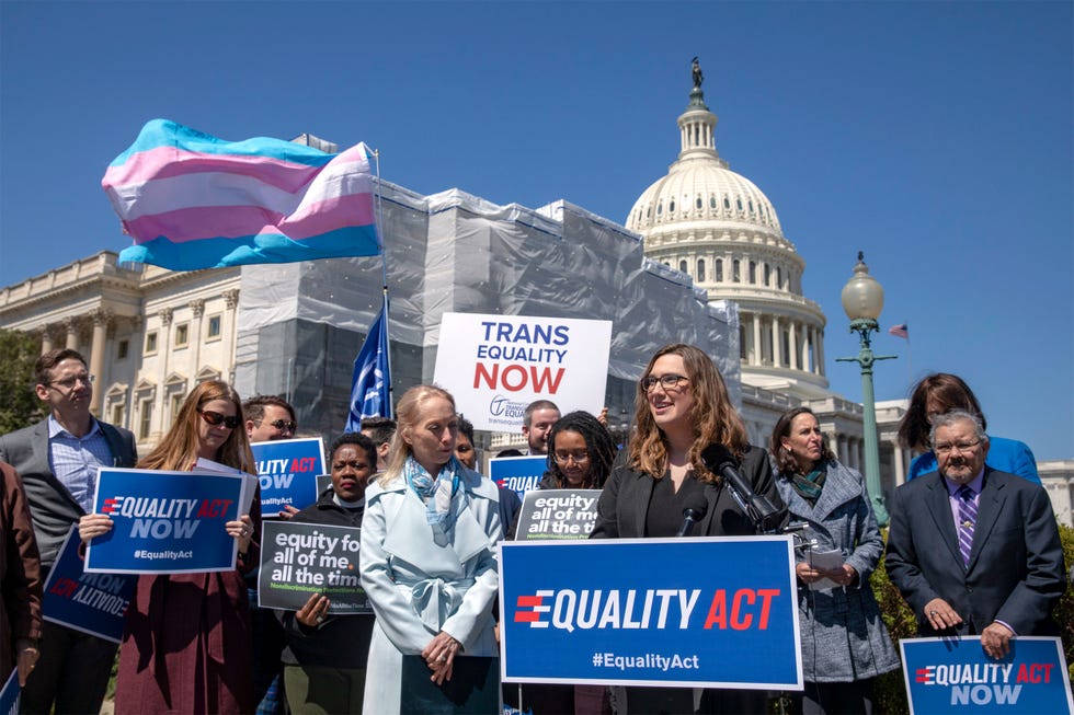 Gathering advocating for the Equality Act outside a significant government building