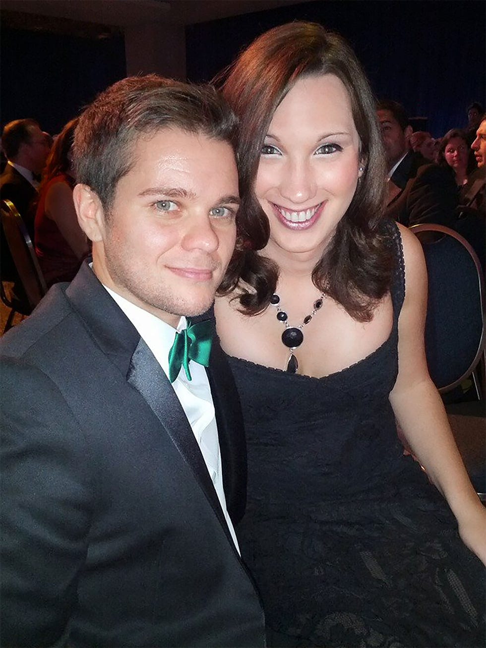 a man and his wife in formal attire