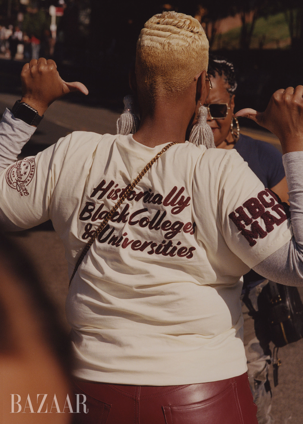 person wearing a shirt that celebrates historically black colleges and universities