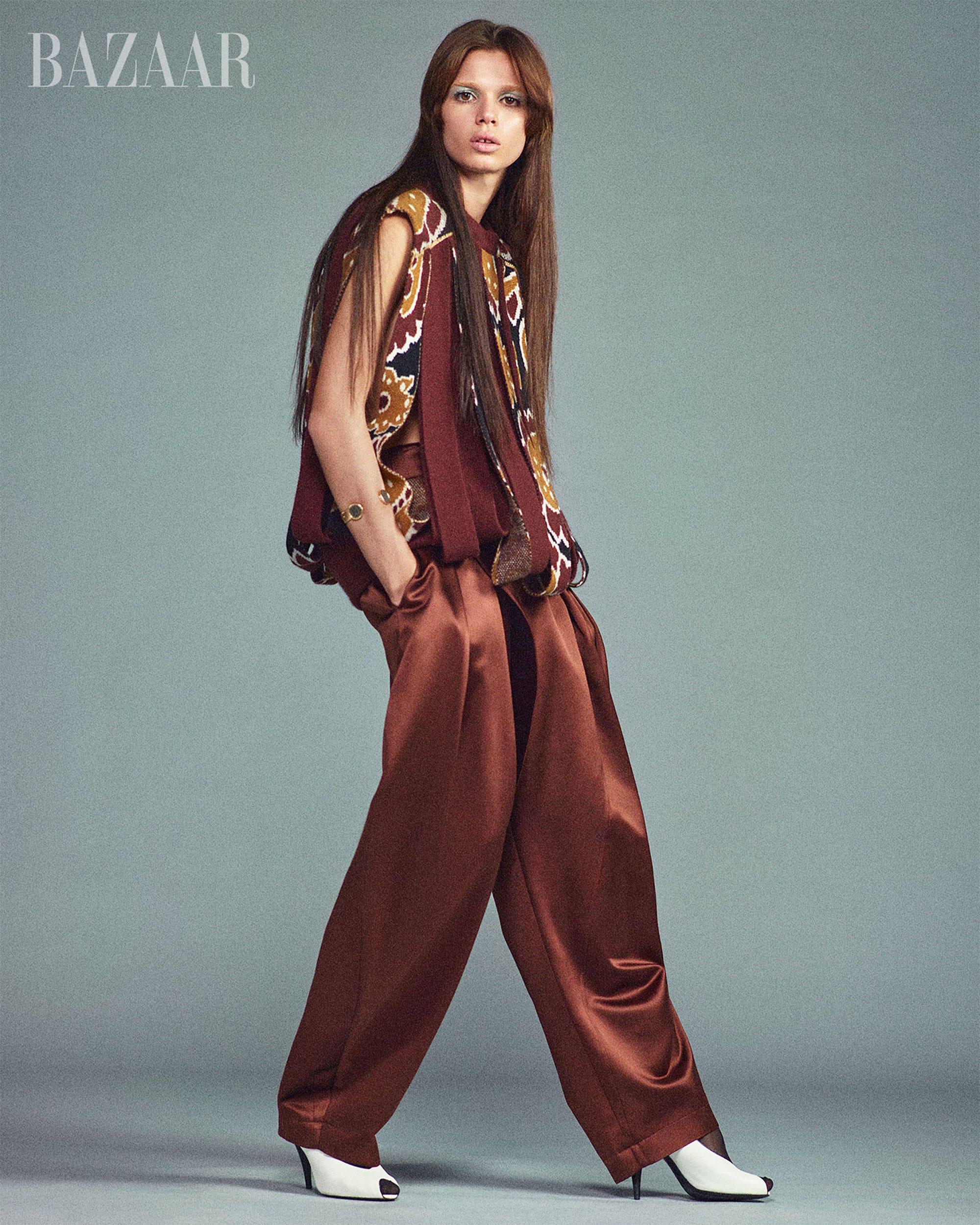 a modern fashion ensemble featuring a stylish top and widelegged pants