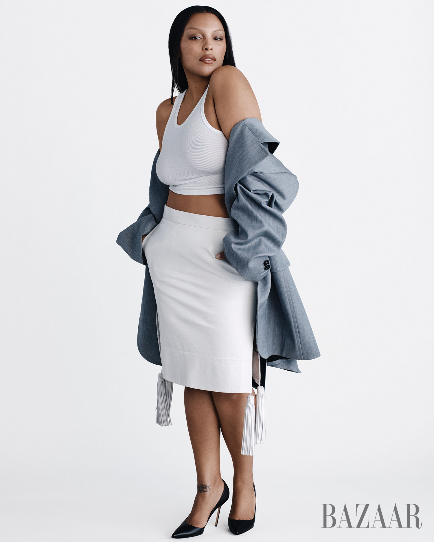 fashion model posing in a stylish outfit