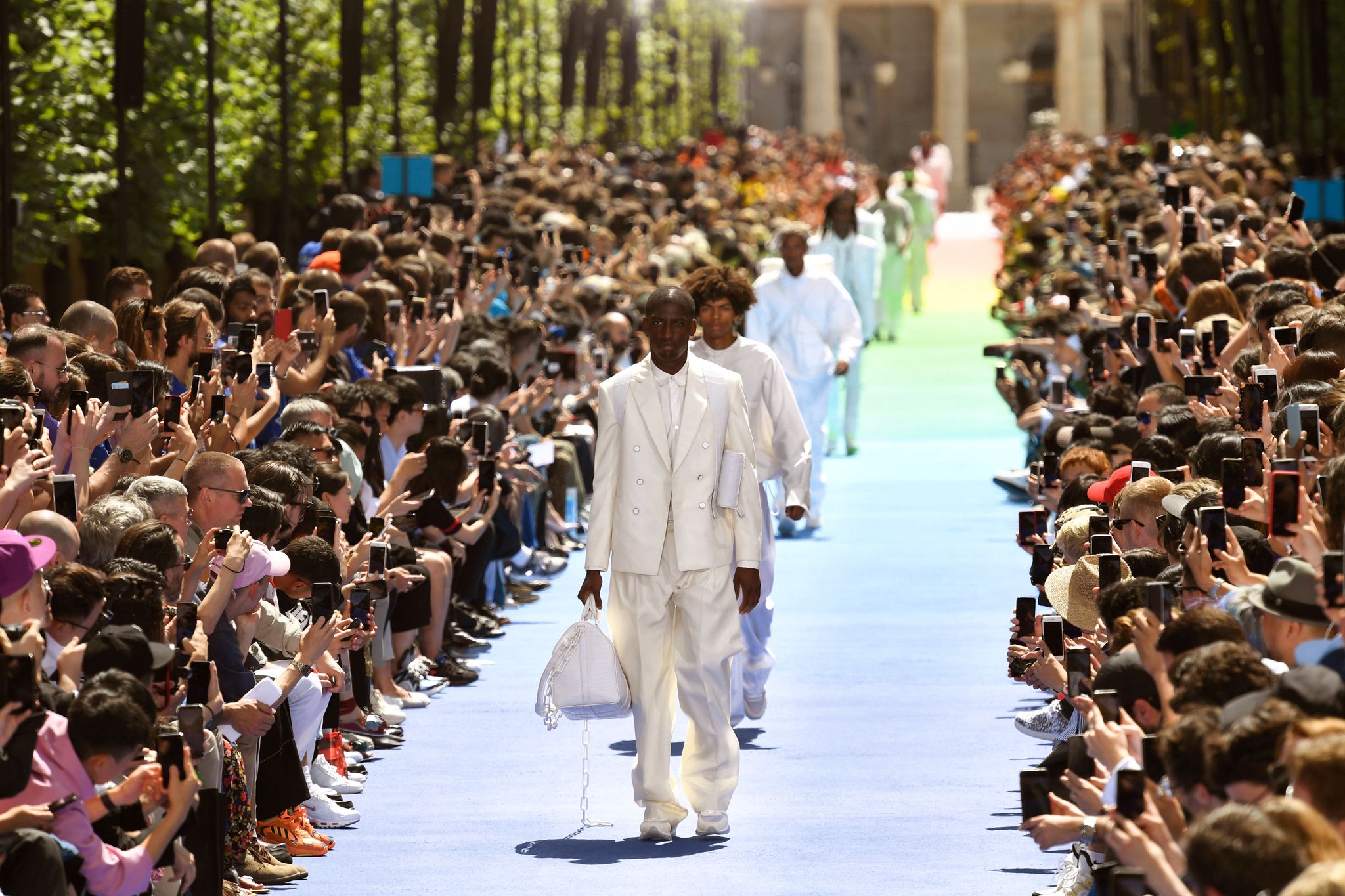 models present creations by louis vuitton fashion house during the men's springsummer 2019 collection fashion show on june 21, 2018 in paris photo by bertrand guay  afp        photo credit should read bertrand guayafp via getty images