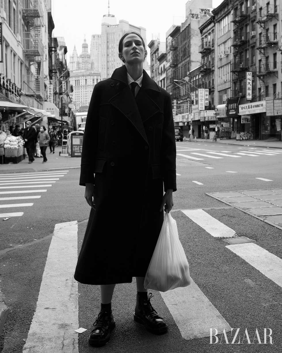 coat\, blouse\, and tie\, dior boots\, ferragamo socks\, falke stepping out statement outerwear, easy tailoring, and sumptuous layers