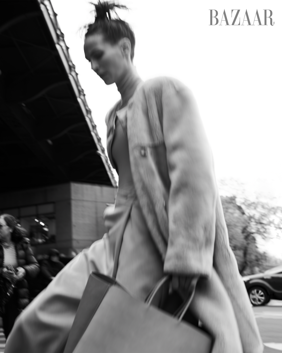 coat\, top\, and trousers\, max mara bag\, bottega veneta stepping out statement outerwear, easy tailoring, and sumptuous layers