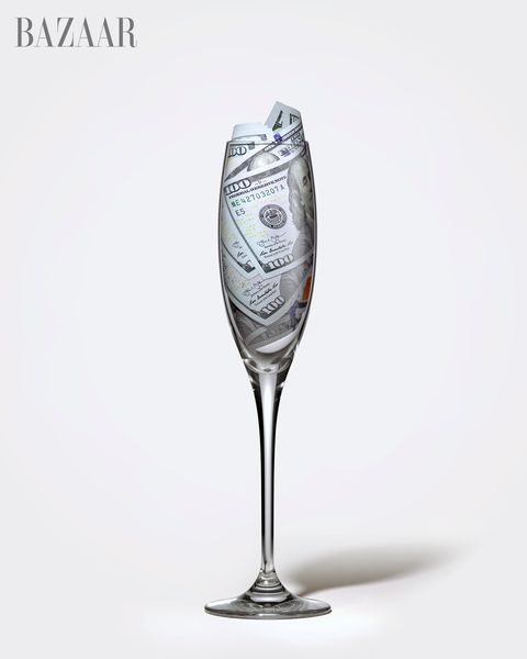 radical giving champagne flute with 100 dollar bills money wealth, philanthropy