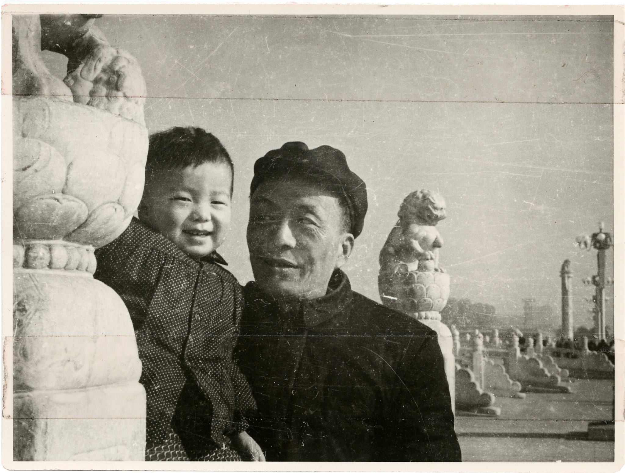 a young ai weiwei being held by his father in tiananmen square in 1959