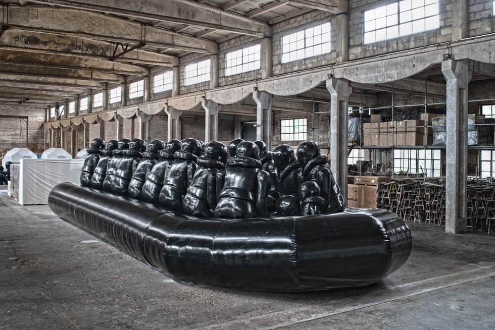 1 boath with 51 figurines black reinforced pvc statue created by chinese artist ai weiwei