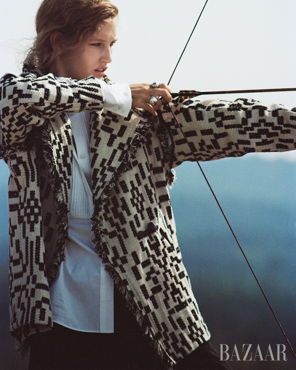 model and bow and arrow