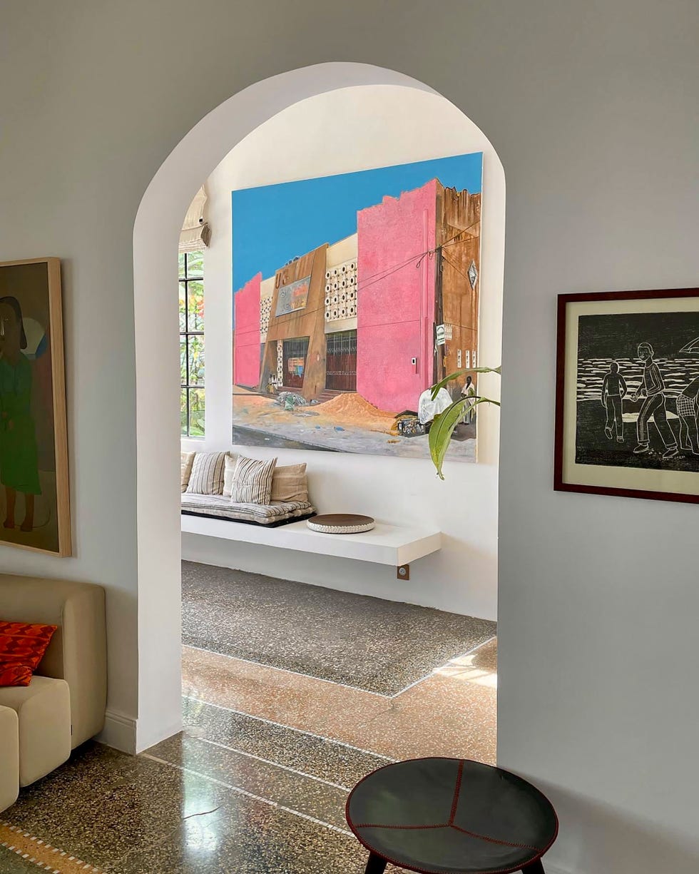 interior space featuring a large mural and seating area