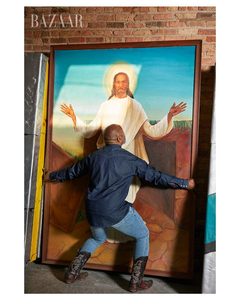 gates with a painting of a black jesus