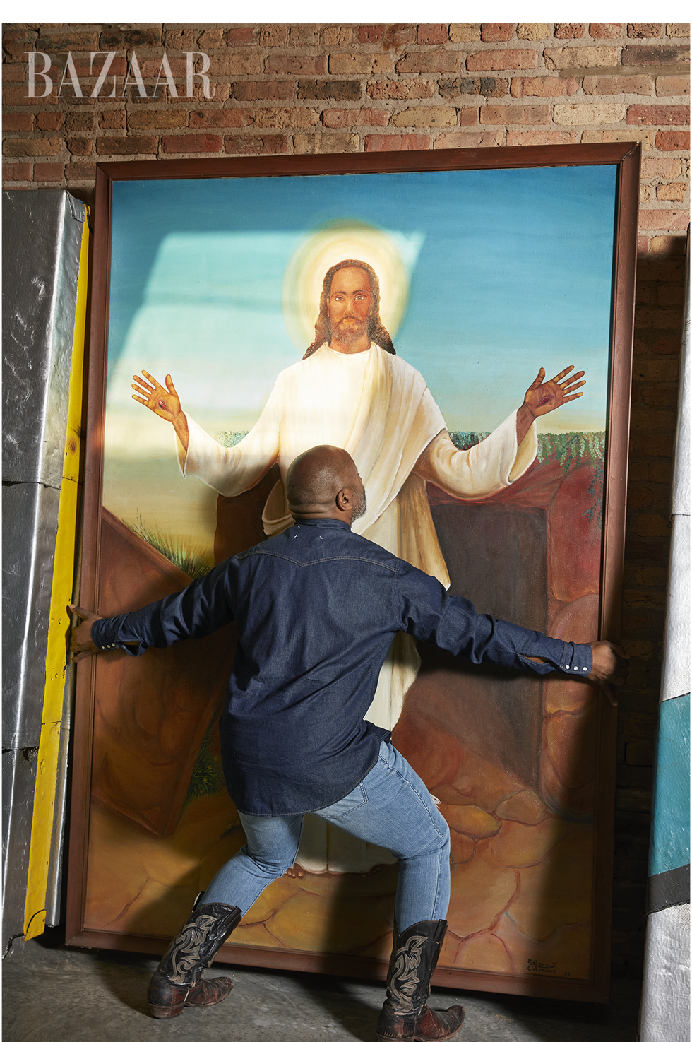 gates with a painting of a black jesus
