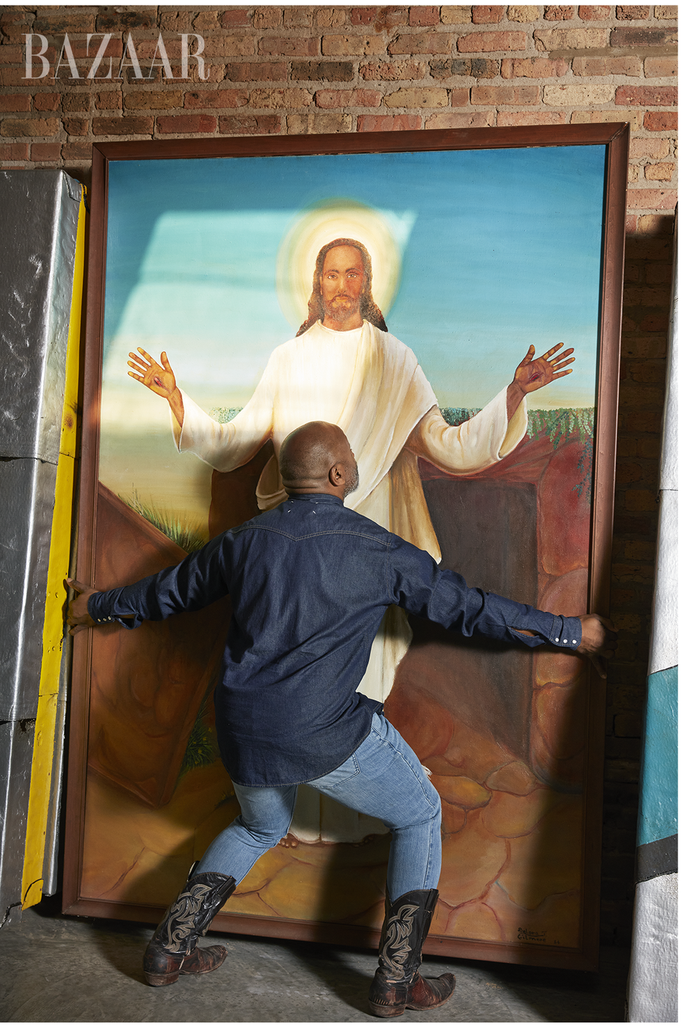 gates with a painting of a black jesus