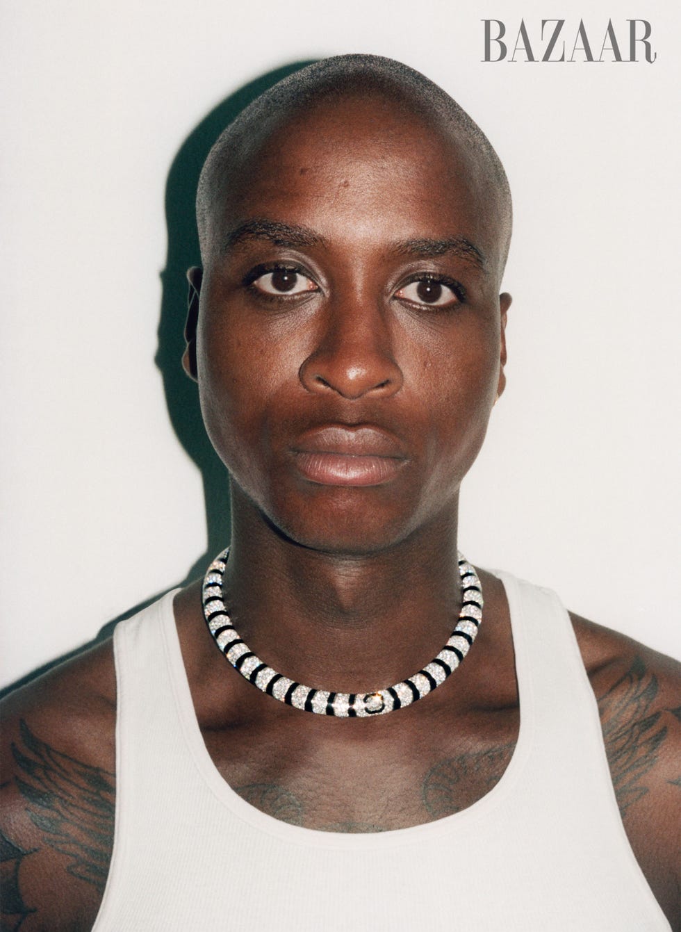 portrait featuring a person wearing a distinctive necklace