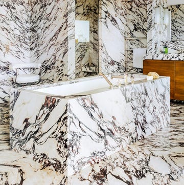 striking marble clad bathroom with freestanding bath striking marble clad bathroom with freestanding bath