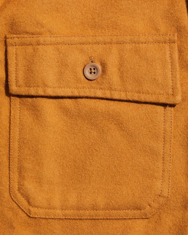 the signature angled chest pocket flap