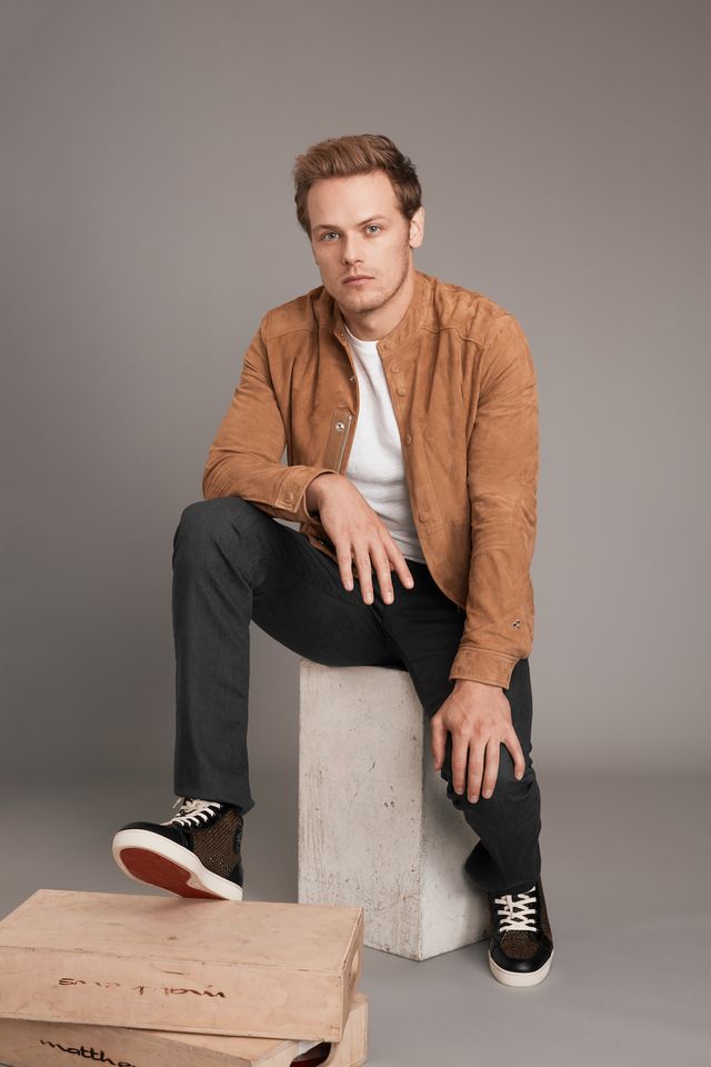 Sitting, Fashion, Standing, Human, Photography, Outerwear, Jeans, Photo shoot, Shoe, Neck, 