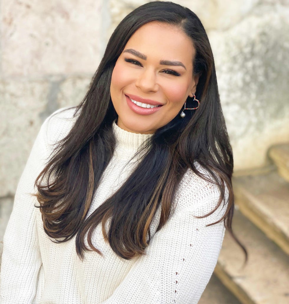 a woman smiling for the camera