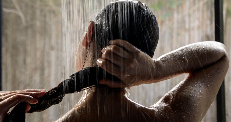 headshot, hispanic woman taking a shower