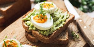 healhy breakfast toast with avocado, egg