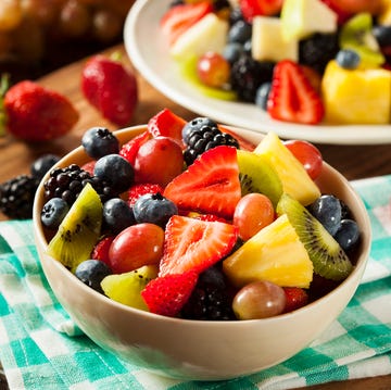 heallthy organic fruit salad with berries pineapple and grapes,romania