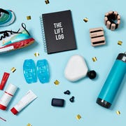 This is an image nike shoes, lift log, bala bangles, hypersphere mini, sanabul boxing gloves, hidratespark watter bottle, theragun mini, jabra earbuds, yoga toes, lululemon sweat kit