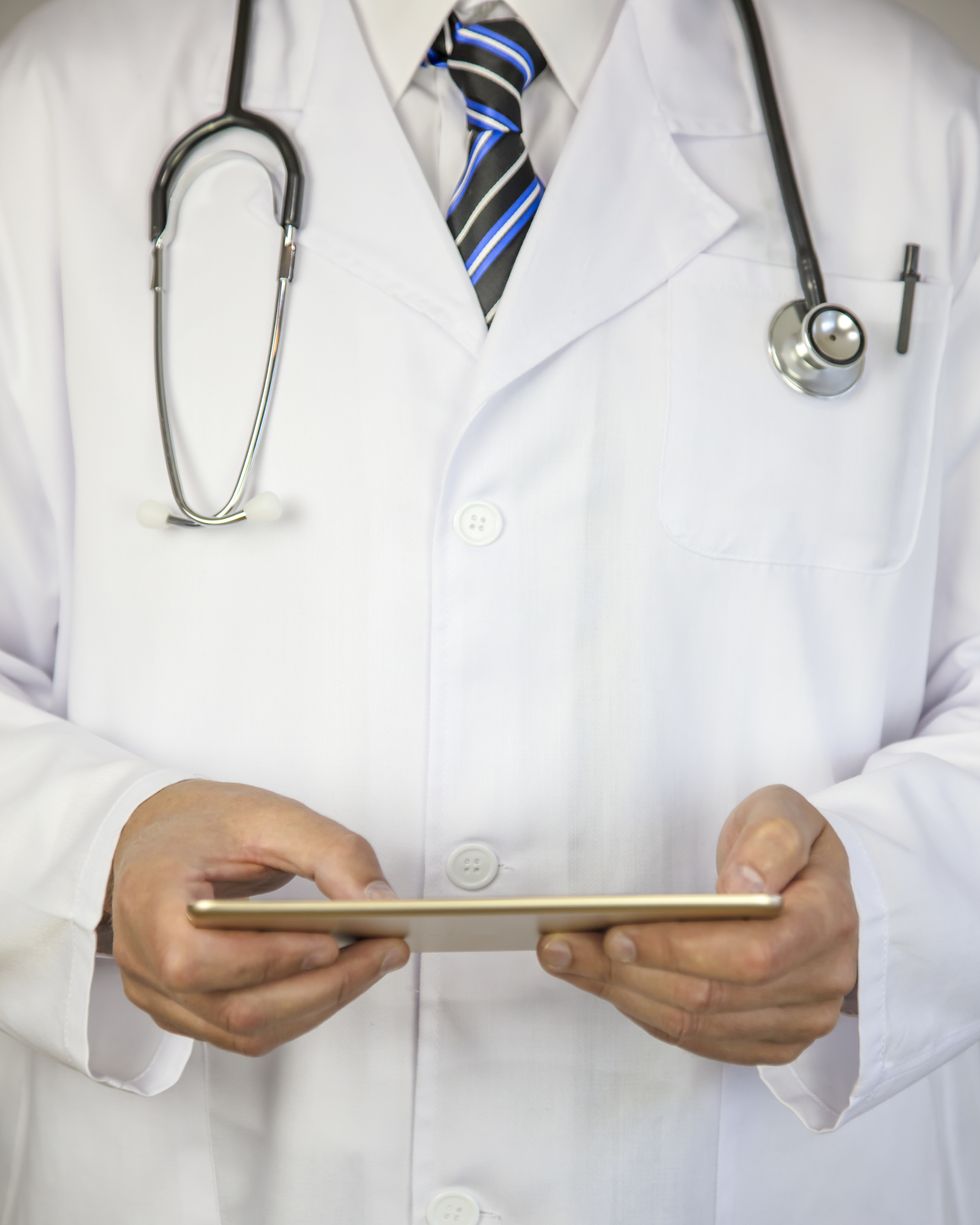 Healthcare And Medicine. Doctor using a digital tablet. Medical concept