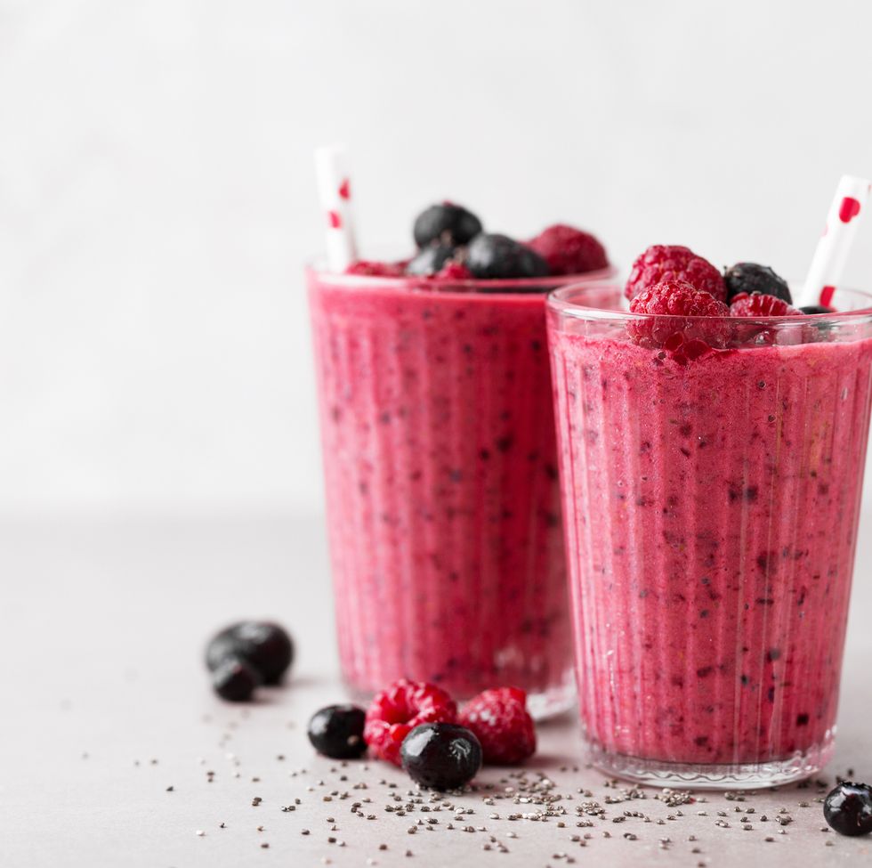 healthy appetizing red smoothie dessert in glasses